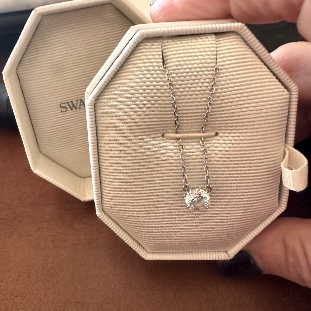 Like new!  Swarovski Elegant Silver Necklace with Crystal Pendant